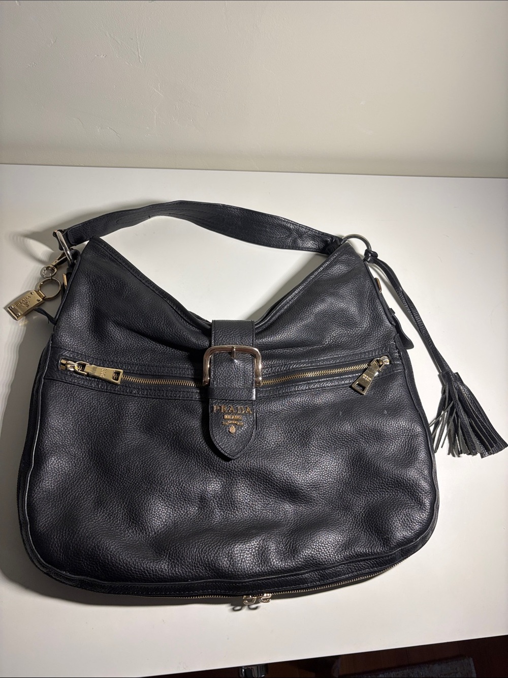 Vintage Prada Black Leather Shoulder Hobo Bag with Gold Hardware and Tassel